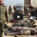 بالفيديو: شاحناتٍ معبئة بجثث داعش تجوب أحياء دير الزور