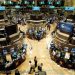 صفقات الاندماج والاستحواذ تقفز بمؤشر البورصة الأمريكية إلى مستوى قياسى