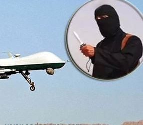 ذباح داعش الملثم.. رصدته طائرة في الرقة